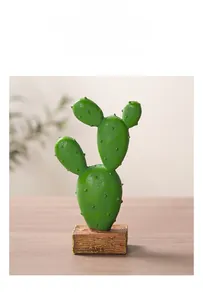 Detailed view of resin cactus ornament with green texture and wooden base for home decor