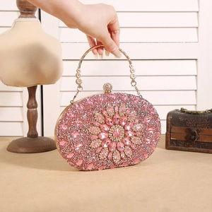 Luxurious pink sunflower evening clutch bag with sparkling rhinestones and gold ring handle