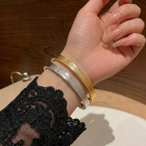 Stainless Steel Bangle With 18K Gold Plated Ribbed Design Round Cubic Zirconia Inlay Oval Hinged Bracelet For Women
