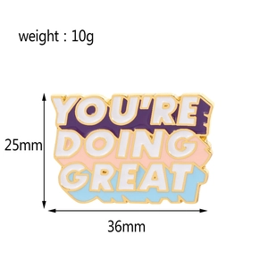 Detailed view of YOU'RE DOING GREAT enamel pin with 25mm height and 36mm width