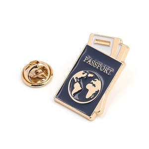 Travel themed passport and boarding pass enamel brooch with golden metal details