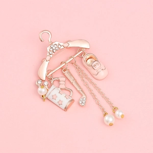 Creative rose gold hanger brooch with pink enamel shoe, golf bag, and pearl pendants