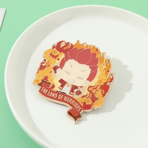 Detail of The Land of Warriors anime enamel pin featuring character with flame design