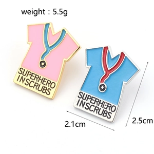 Detail view of enamel stethoscope pins with Superhero In Scrubs text and size specs