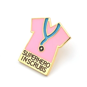 Pink superhero in scrubs enamel pin with stethoscope and gold metal plating for doctors