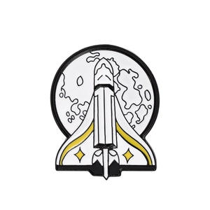 Space shuttle enamel pin with lunar planet background, sleek black and white metal badge