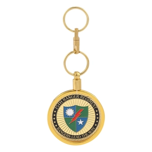 Detail of a 75th Ranger Regiment metal keychain with gold finish and military crest