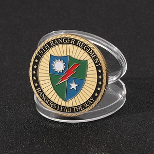 Macro shot of 75th Ranger Regiment gold challenge coin with colorful enamel detailing