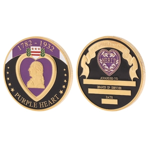 Macro view of Purple Heart commemorative medal showing detailed front and back designs
