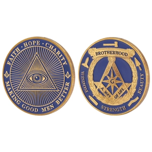 Macro detail of gold Masonic challenge coins with blue enamel and engraved mottos