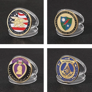 Custom challenge coins set with military enamel badges in clear acrylic display boxes