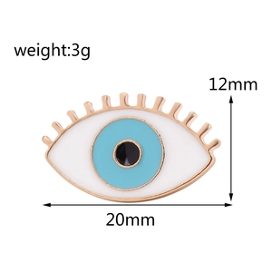 Detailed size view of an evil eye brooch showing 12mm by 20mm dimensions and 3g weight