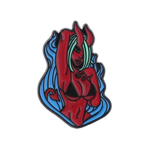 Cartoon little devil enamel pin with green hair and red horns for backpacks and clothing