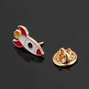 Fashionable enamel rocket pin badge with red white and yellow finish on gold alloy base