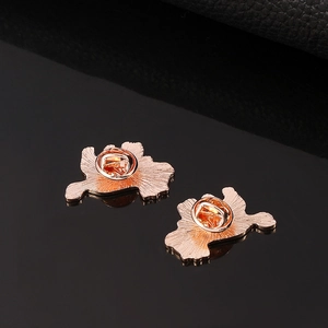 Ginkgo leaf metal brooches with rose gold finish and secure butterfly clasps