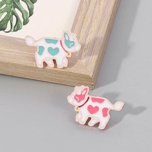 Cartoon flying cow enamel pins set with heart patterns and gold metal edges