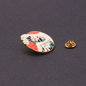 Cartoon Great Wave enamel pin with gold plating and blue sea wave badge for backpacks