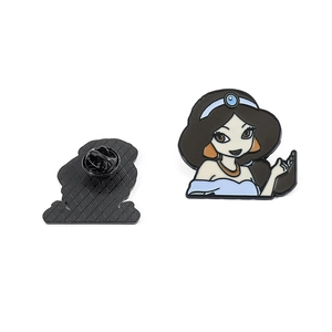 Detail of Jasmine princess enamel pin showing the front design and textured back with clutch