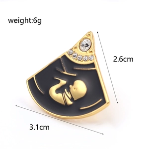 Creatieve baby emaille broche, zwarte basis met gouden foetus reliëf, 3,1x2,6cm