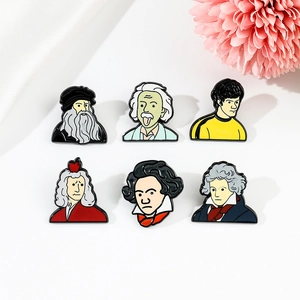 Detailed view of six cartoon historical figure enamel pins including Einstein and Newton