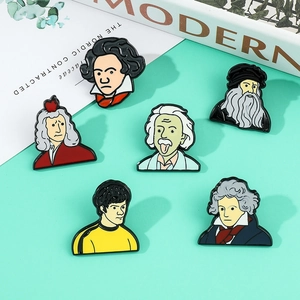 Detail view of a 6-piece enamel pin set featuring cartoon famous cultural figures