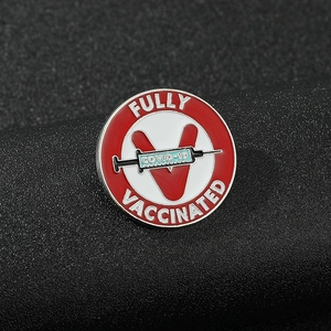 COVID-19 Fully Vaccinated syringe badge with V symbol in red, white and blue alloy