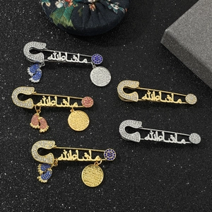 Muslim Mashallah safety pin brooch set with baby feet charms and colorful rhinestones