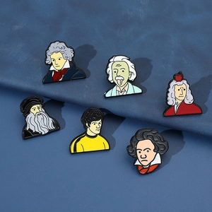 Macro detail of high-quality enamel pins set featuring iconic historical figures