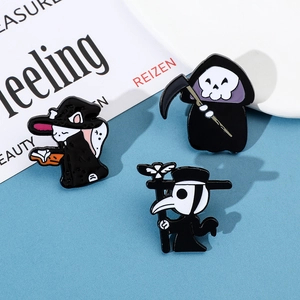 Detail of gothic enamel pins featuring Grim Reaper, witch cat, and plague doctor motifs