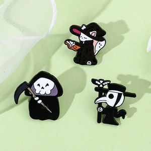 Detail of Halloween enamel pins featuring grim reaper, black cat, and plague doctor
