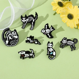 Detailed set of seven dark enamel pins featuring skeleton cat and dog animal motifs