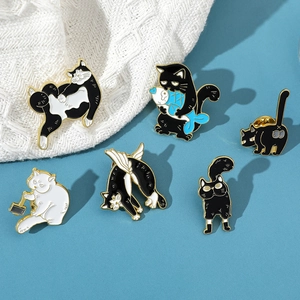 Detailed view of six cartoon cat enamel pins featuring humorous poses on blue background