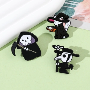 Macro detail of enamel pins featuring grim reaper and wizard cat metal badges