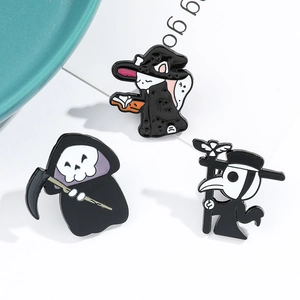 Detail of Halloween enamel pins featuring a magic cat, grim reaper, and plague doctor