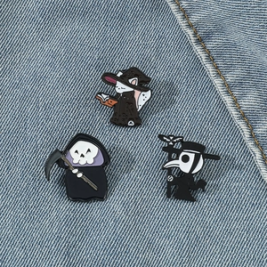 Three-piece Halloween enamel pin set featuring a wizard cat, grim reaper and plague doctor