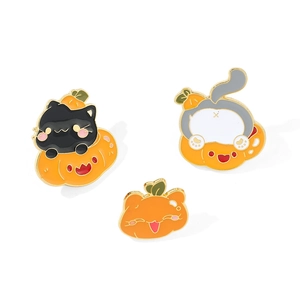Three-piece Halloween enamel pin set featuring black cats and pumpkins in festive orange