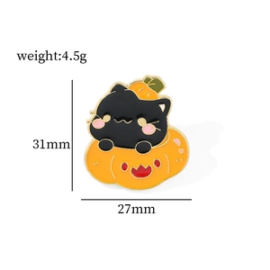 Detail of Halloween cat in pumpkin enamel pin showing dimensions 31mm by 27mm