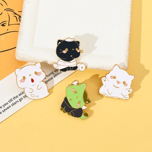 Set of four cute Halloween enamel pins featuring mummy, Frankenstein and ghost cat designs