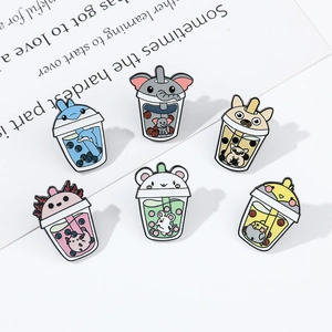 Detail of 6-piece cartoon animal enamel pin set featuring dolphin and elephant boba tea
