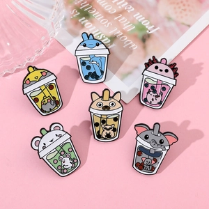 Cute cartoon animal bubble tea enamel pins collection on a pink decorative background