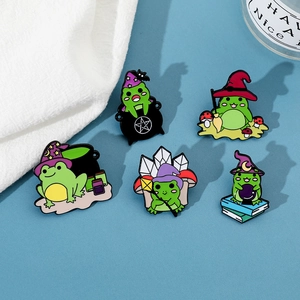 Set of five creative magic frog enamel pins featuring wizard hats and crystal balls