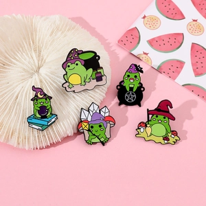 Set of five green magic frog enamel pins with wizard hats and crystal balls for Halloween