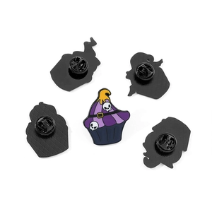 Halloween cupcake enamel pins with skull and wizard hat icons on white background