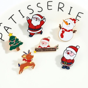 Set of 6 colorful Christmas enamel pins featuring Santa, reindeer, and snowman