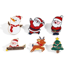 Detail of 6-piece Christmas enamel pins set with Santa, reindeer, snowman and tree