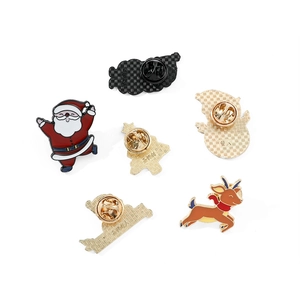 Christmas enamel pins set featuring Santa Claus, reindeer, and snowman in festive gold finish