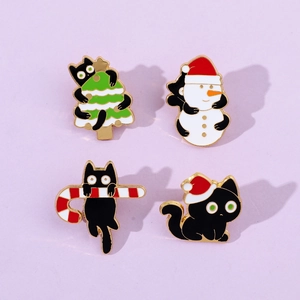 Detailed set of four cartoon black cat enamel pins featuring festive Christmas motifs