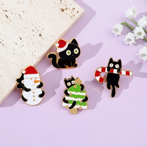 Set of four cute Christmas black cat enamel pins featuring Santa hats and festive motifs