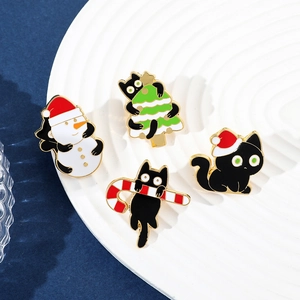 Cute Christmas black cat enamel pin set with snowman and Santa hat on white tray
