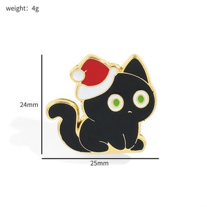Detail view of cartoon black cat Christmas brooch with dimensions 25mm x 24mm and 4g weight